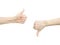 Closeup of two female hands showing thumb up and down signs against white background. Isolared communication gesture objects to sh
