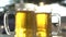 Closeup of two lager beer mugs with sun rays