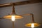 Closeup with two metallic lamps. Two golden metallic lighted lam