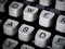 Closeup of typewriter keyboard, WASD highlighted