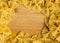 Closeup of uncooked italian pasta frame - farfalle