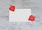 Closeup Valentine card with red hearts on gray background