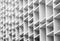 Closeup ventilated facade of concrete building. White ventilation with creative and beautiful pattern architecture
