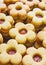 Closeup vertical shot of cute cookies with jam
