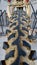 Closeup vertical shot of a golden vintage bicycle tire details