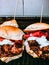 Closeup vertical shot of tasty looking big burgers