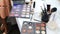 Closeup video of colorful palette with paints and shadows for makeup. Professional makeup artist or visagiste holding