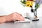 Closeup video of female hands, typing on the PS keyboard, at the table in the office