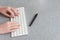 Closeup video of female hands, typing on the PS keyboard, at the table in the office