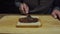 Closeup video: spreading chocolate butter on a piece of bread