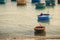 Closeup Vietnamese Round Fishing Boats in Sea by Beach