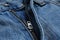 Closeup view of blue jeans with zipper as background