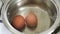 Closeup view boiling eggs in water