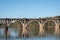 Closeup view of bridge with great reflections in the water below.