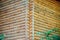 Closeup view of corner of wooden house made of natural logs - wooden construction background