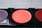 Closeup view of cream lipstick palette refills. Professional cosmetic product