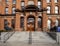 A closeup view of the entrance to the Saratoga Springs City Hall, an ornate three-story