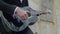 Closeup view of groom playing guitar