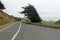 A closeup view of the highway 1 road along the rugged shoreline of the northern california with rugged endless views of the ocean