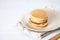 Closeup view on on homemade classic stack of american pancake on white background with morning light. Breakfast food. selective