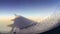 Closeup view of ice crystals or icicles formation outside airplane window