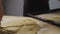 Closeup view of laying out ginger cookies on a baking sheet