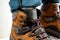 Closeup view of man leg in trekking boots