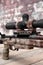 Closeup view of modern powerful sniper rifle with telescopic sight