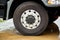 Closeup view of a rubber tire on a truck.Truck Wheels and Tires Closeup Photo.