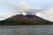 Closeup view of  Sakurajima seen around Kamoikekaizuri Park during sunset