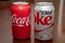 Closeup View of Several Cans of Coca Cola and Diet Coke