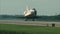Closeup view of shuttle landing. Space shuttle Discovery is landing on runway