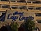 Closeup view of sign above the entrance of Hotel Paradise Lago Taurito, a popular tourist accommodation in Gran Canaria.