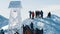 Closeup View of a Snow-covered Bell Tower - Hikers on a snowy mountain peak