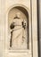 Closeup view statue of Saint Peter in a front niche of the Church of Santa Maria della Grazia