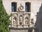 Closeup view of statues above the entrance door of the San Gil and Santa Ana Church in Granada, Spain