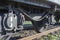 A closeup view of the wheels of a train