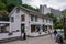 Closeup view of a white restaurant building in the Geiranger Fjord Sea town