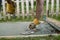 Closeup view of a workman leveling a concrete surface