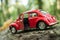 Closeup of vintage red miniature volkswagen bettle in outdoor