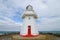 Closeup from Waipapa Point Lighthouse cloudy skya Point Lighthouse with a cloudy sky