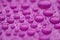 Closeup waterdrops on purple ceramic coated paint surface