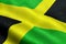 Closeup of waving jamaica flag, cross stripes, national symbol of jamaican