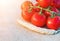 Closeup wheat ear and of fresh, ripe tomatoes