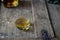 Closeup of whisky glass and bottle on a shabby wooden barrel