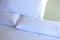 Closeup of white bedclothes and pillow