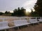 Closeup of white benches at Orlowo beach, Gdynia, Poland