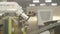 Closeup White High-tech Mitsubishi Robotic Arm Takes Details