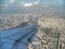 Closeup window seat from air-craft with city view in Los Angeles.