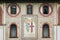 Closeup windows and emblem details of Sforza Castle (Palazzo Sforzesco), one of the main landmarks and tourist attractions of